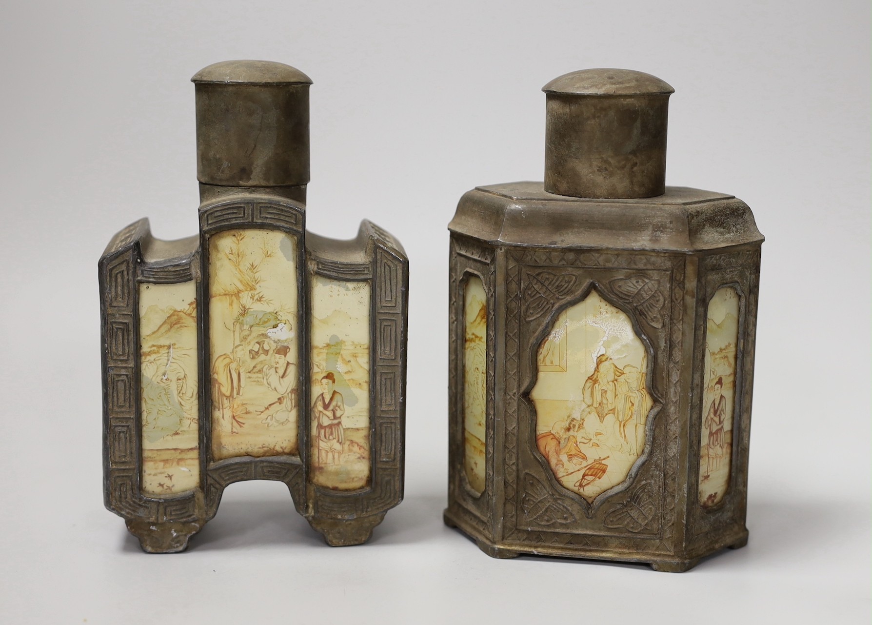 Two Chinese pewter tea caddies with glass panelled decoration. 18cm high